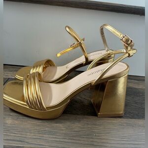 Gold platform heels